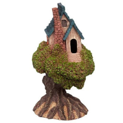 Treehouse aquarium ornament with blue roof cottage on a mossy tree trunk
